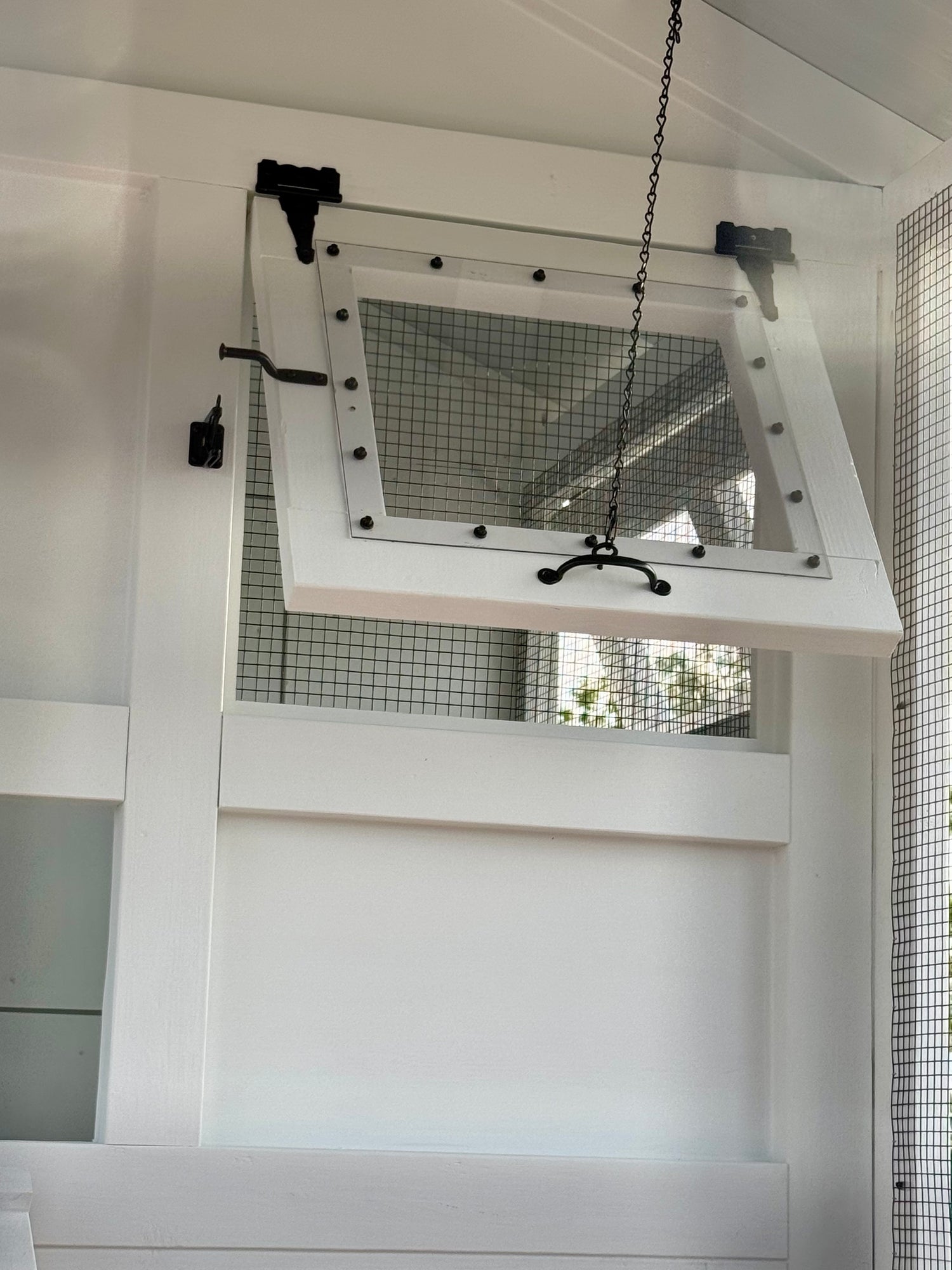 A view of the 3/4" overlap that Rocky Mountain Coops builds into the inner-framing of their custom chicken coop's windows and doors that ensures cold wind doesn't hinder the comfortably living of the chickens kept within during the cold seasons.